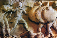 Фрагмент фриза сокровищницы сифнийцев с Аполлоном и Артемидой (слева). Около 525 г. до н.э. Дельфы